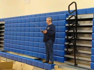 Man Operating Patches the Pumper